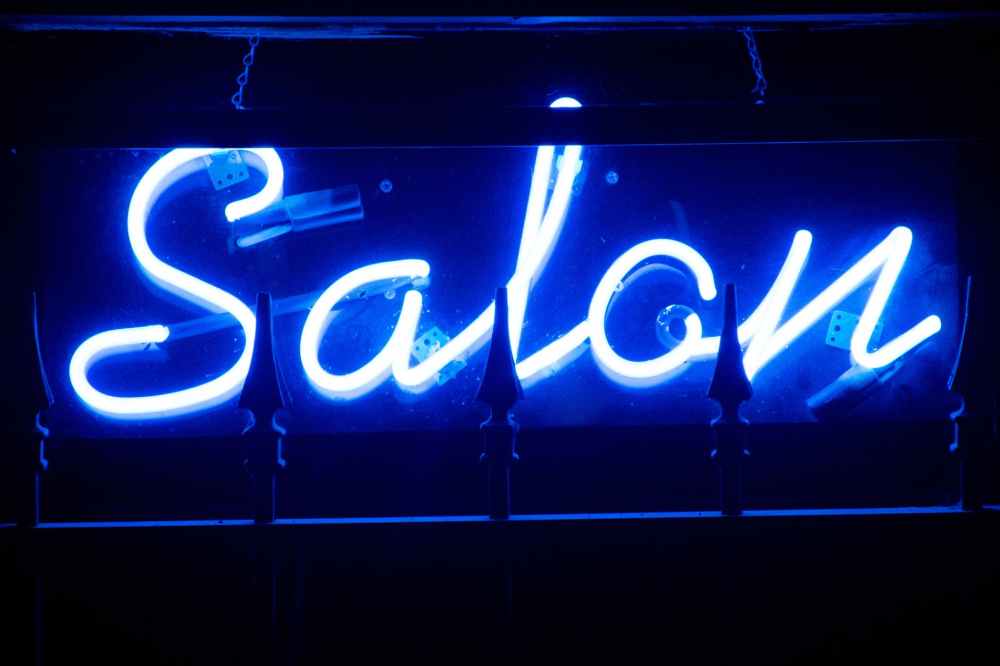 blue salon neon signage